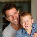 Australian parent smiling with son